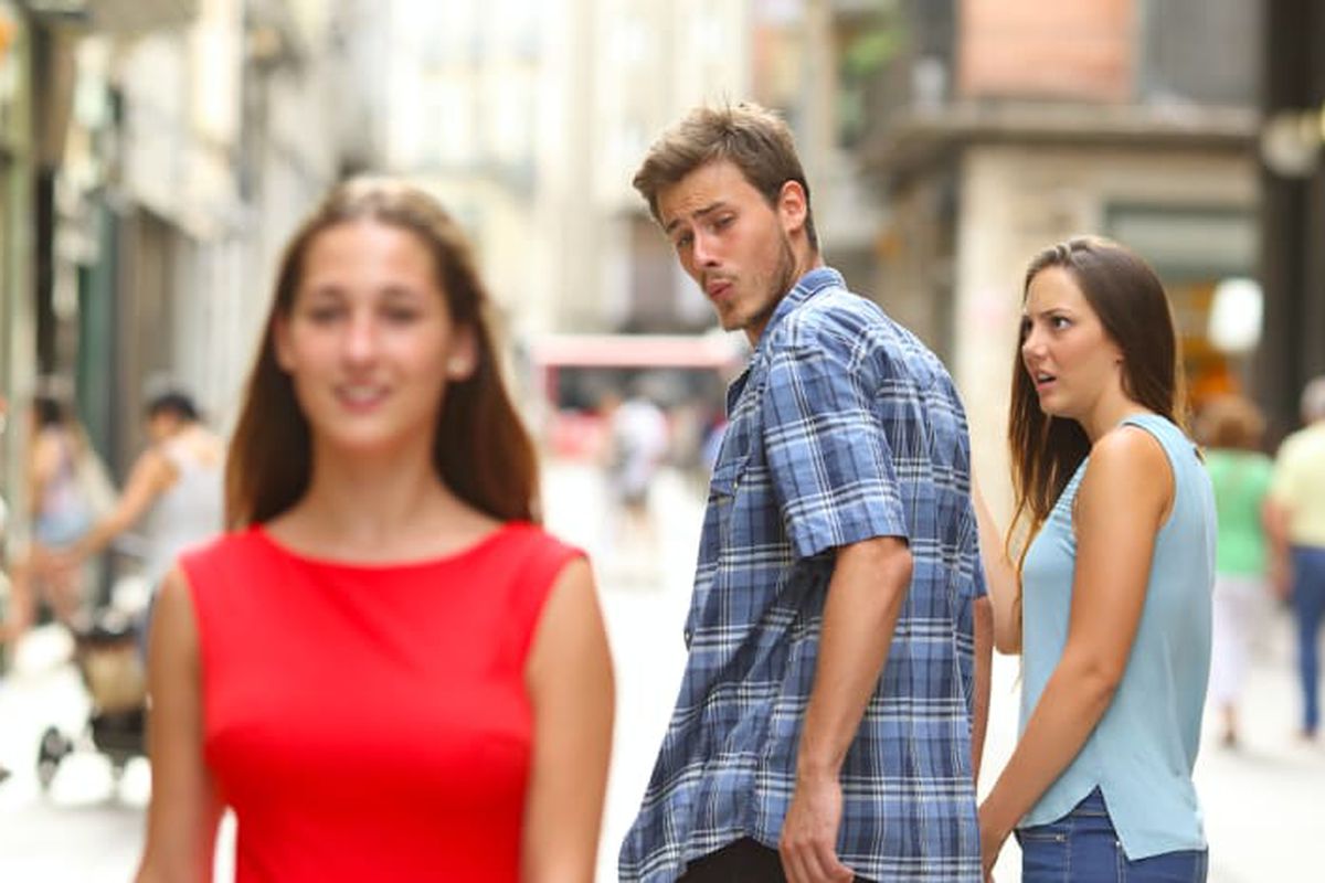 Distracted Boyfriend meme about Lucky Energy