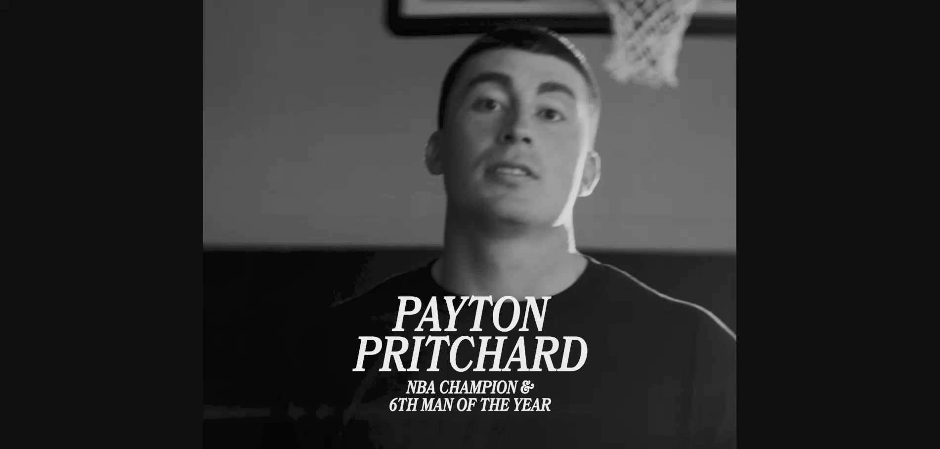 Video still from the Lucky Energy site: a basketball player in a black and white portrait