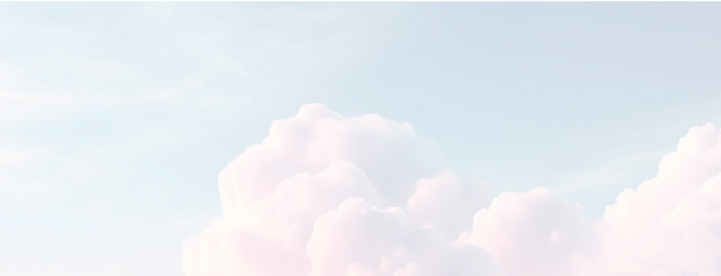 Soft pink clouds in a pale sky